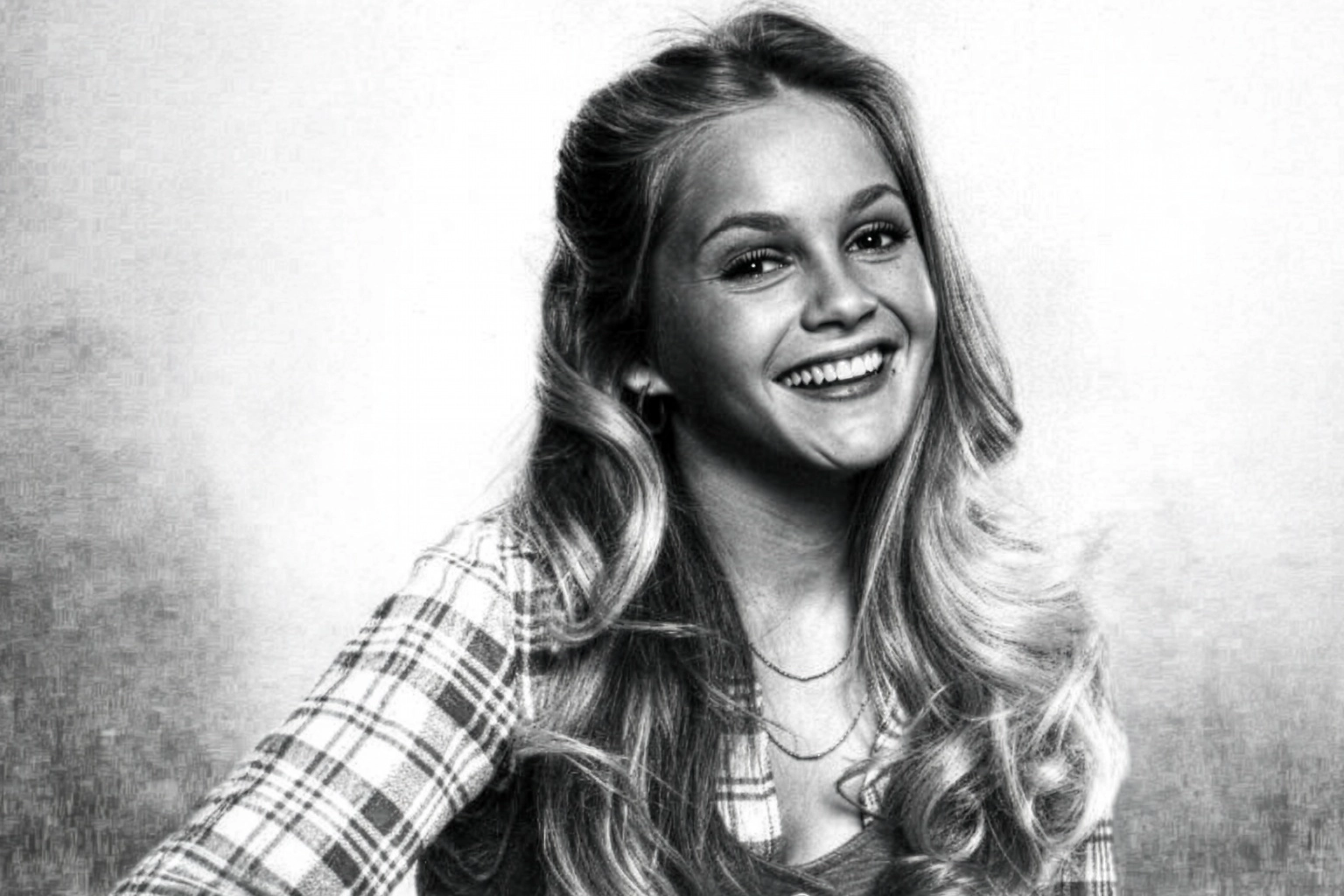 Charlene Tilton as Lucy Ewing on Dallas
